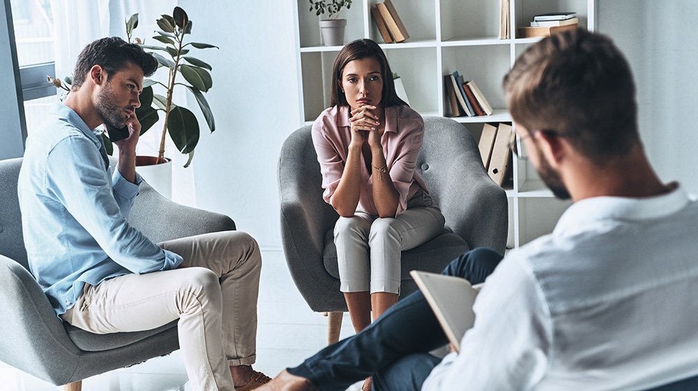 Spouses Speaking to a Divorce Mediator